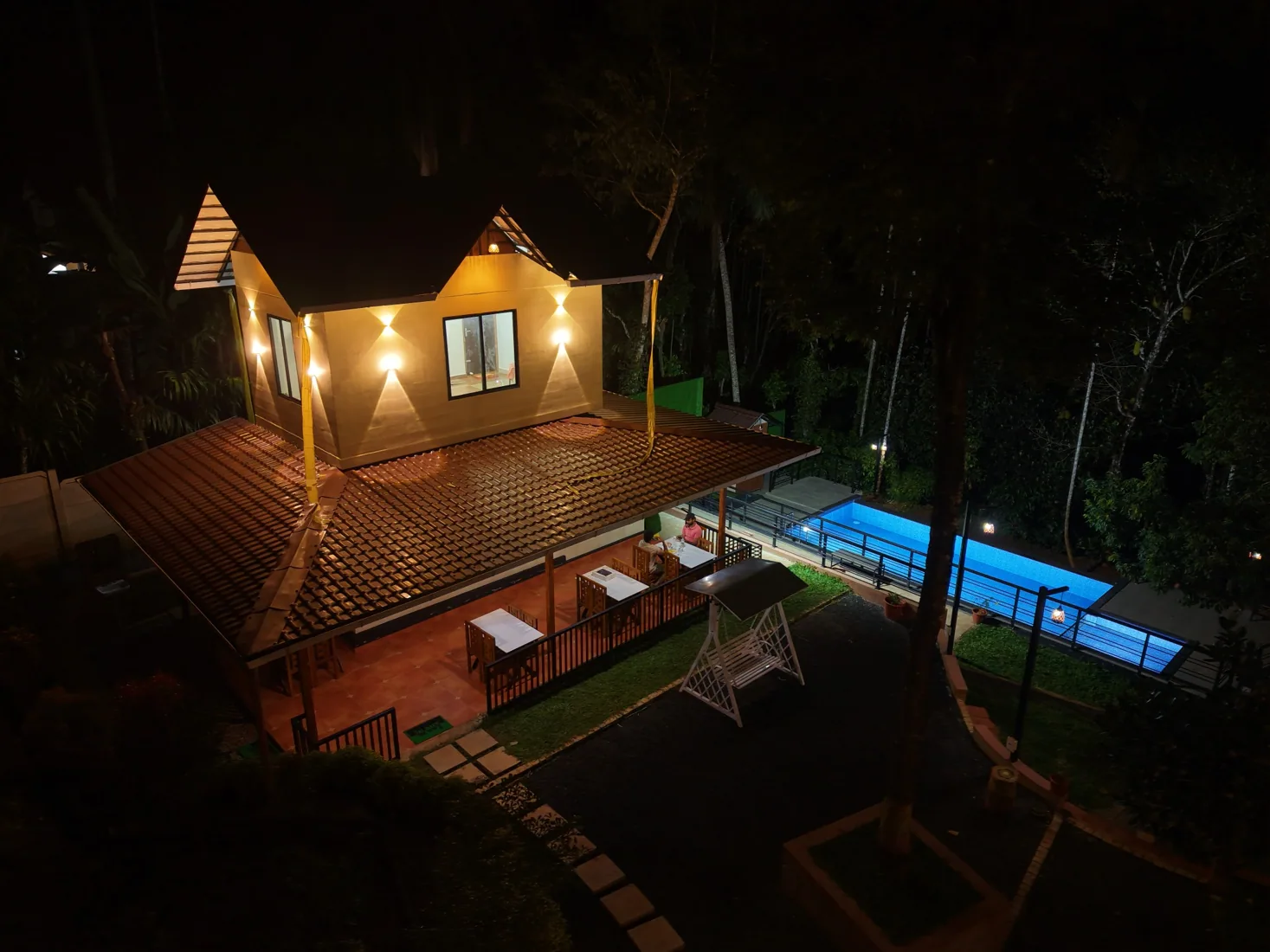 Illuminated swimming pool at night