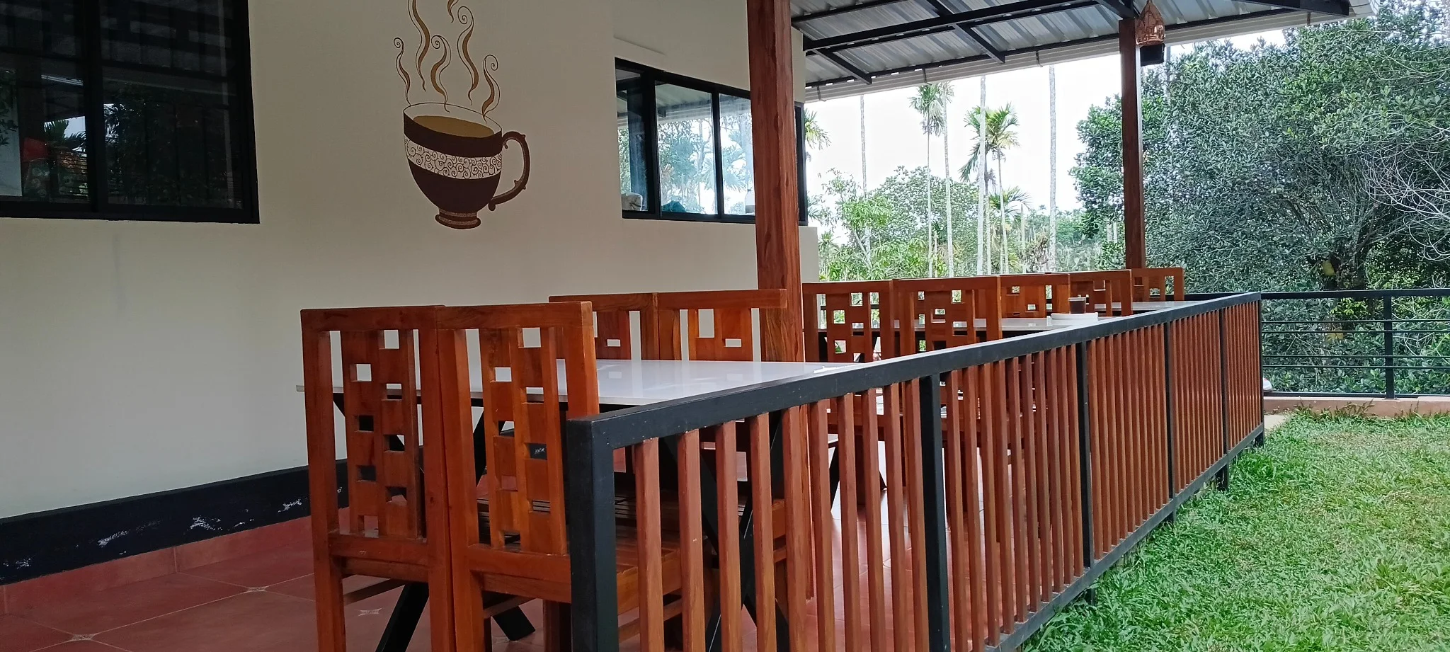 Outdoor dining area with wooden chairs
